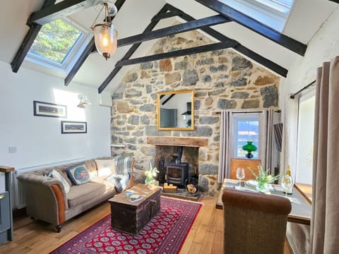 Furniture, Interior Design, Home, Stone Wall, Cottage, Ceiling, Couch, Houseplant, Living Room, Natural Material