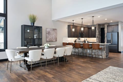 The kitchen is stocked with a robust supply of pots and pans.