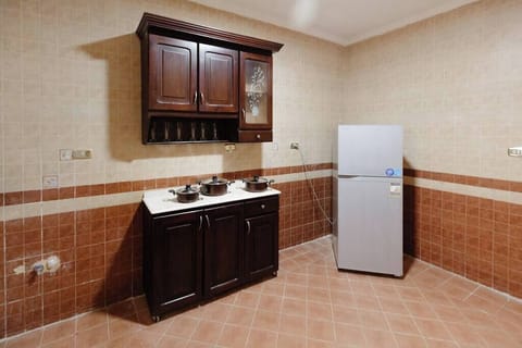 Fridge, microwave, oven, cookware/dishes/utensils