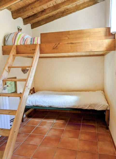 Room with wooden bunk beds and cabin atmosphere