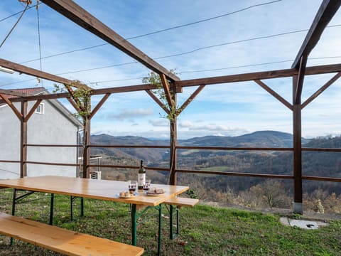 Sky, Cloud, Property, Furniture, Shade, Wood, Table, Interior Design, Outdoor Furniture, Plant