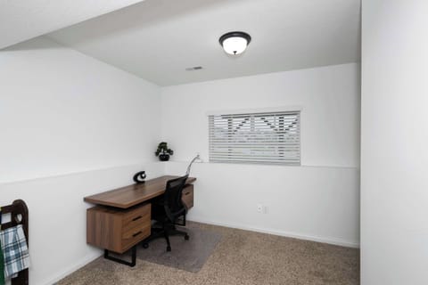 Catch up on emails at the lower level’s convenient desk workspace