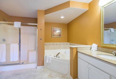 Shower, jetted tub, eco-friendly toiletries, hair dryer