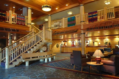 Arrive to a welcoming reception area framed by rustic timbers.