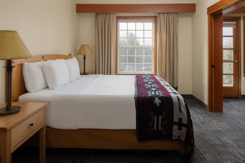 Unit with 1 King bed. Exact unit will be assigned upon arrival. Views, colors, and decor may vary.