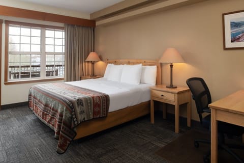 Unit with 1 Queen bed. Exact unit will be assigned upon arrival. Views, colors, and decor may vary.