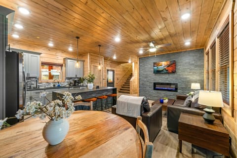 Spacious & cozy living room with mountain views, Smart TV, and fireplace — the perfect place to unwind.