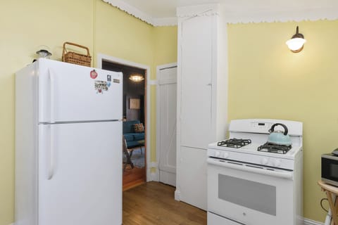 The kitchen opens to the living and dining areas.