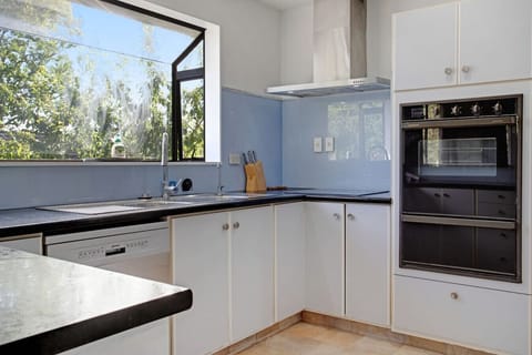 The kitchen has plenty of storage if you want to stay longer.