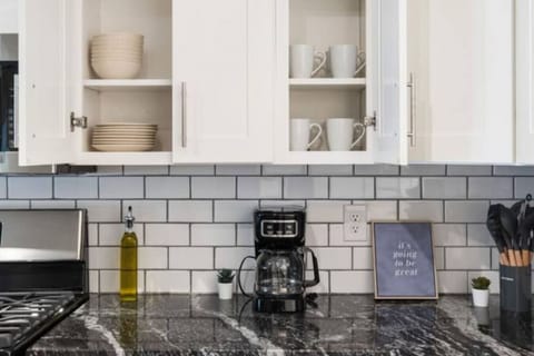 Fully equipped kitchen with all the tools you need for a perfect culinary experience. Enjoy the convenience of having everything at your fingertips!