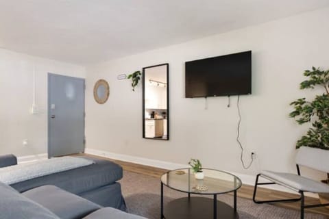 Relax in the living room and watch your favorite shows, lounging is a great way to unwind after a long day.