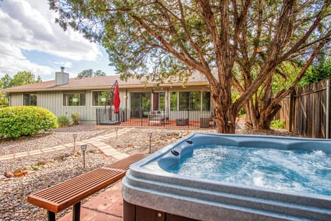 Backyard with a hot tub available all year round.