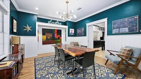 A formal dining room just off of the kitchen and main entrance of the home offers seating for 6.
