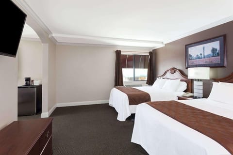 Settle into crisp linens with a spacious double‑bed layout.