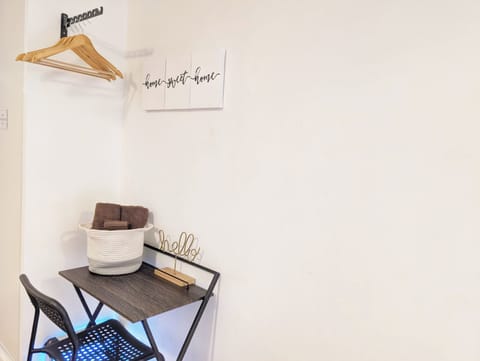 Compact work area with table and chair—ideal for remote work or study sessions.