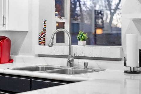 The bay window lets in ample light to kitchen