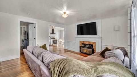 A relaxing living room area, designed for comfort and ease. With cozy seating, soft lighting, and a welcoming atmosphere, it’s the perfect place to unwind, read a book, or enjoy quality time with family and friends.