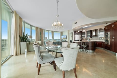 Gather, eat, and make memories. Our spacious dining area and adjacent breakfast bar provide plenty of room for guests to enjoy meals and conversations, creating the perfect setting for your vacation.