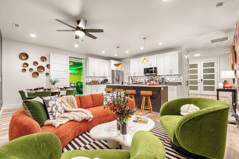 With an open floor plan that seamlessly blends the living, dining, and kitchen areas, this space brings everyone together—whether you're cooking, lounging, or sharing great conversation.