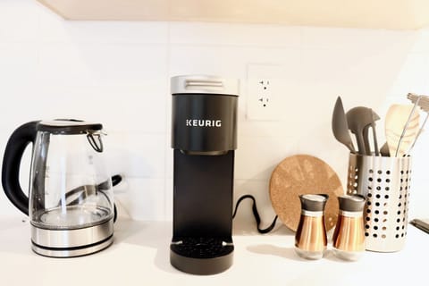 Essentials like coffee maker and kettle for your convenience.