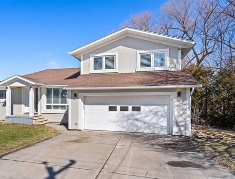 8357 Beaverdams Frontal View in Winter. 4 Bedroom 3 Bathroom Home