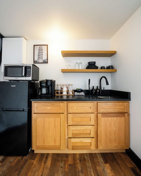 Fridge, microwave, stovetop, coffee/tea maker