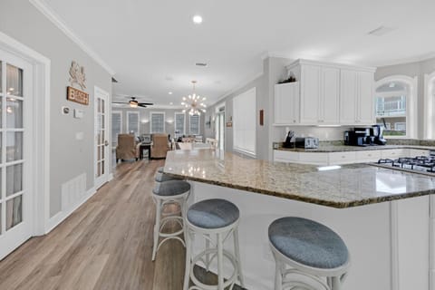 Kitchen bar overlooking the dining and living areas