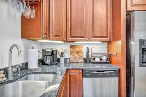 Fully equipped kitchen with modern appliances, granite countertops, and everything you need for a convenient stay.
