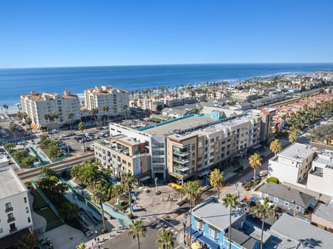 A bird's-eye perspective of Oceanside's downtown area alongside the Salt complex