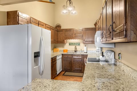 Kitchen - Our galley kitchen with granite countertops.