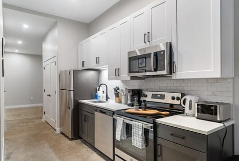 As you step into the kitchen, the clean lines and functional design make you eager to start cooking your favorite dishes.
