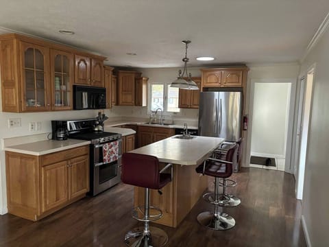 Gas stove with double ovens.