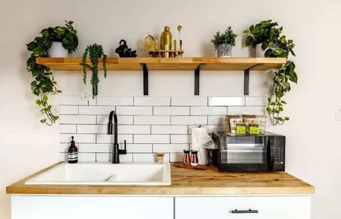 style meets function in this updated kitchen with everything you need to whip up something amazing