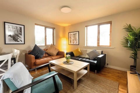 Open plan living room to kitchen - gas central heating and 55 inch smart tv .