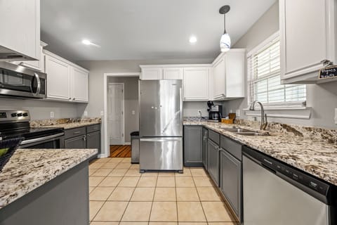 Cook a great meal in our well-stocked kitchen with full-size appliances.