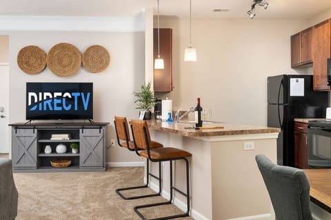 Lots of comfortable seating with the living room, dining table, and bar seating - all in the main living area.