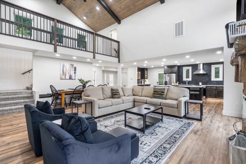 Curl up by the living room fireplace & stream your favorites on the smart TV