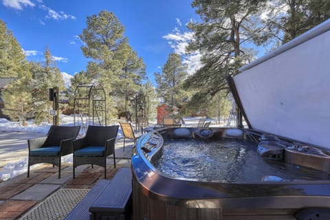 This private hot tub is nestled in a wooded yard with beautiful views. A quick walk to Born Lake and nature galore! Pet friendly and guest approved!