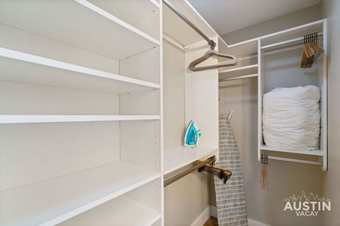 Unpack and feel right at home. This convenient closet offers ample space to store your luggage and belongings, making your stay as comfortable as possible.