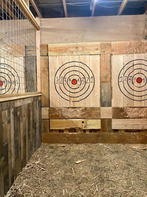 Experience the excitement of axe throwing.