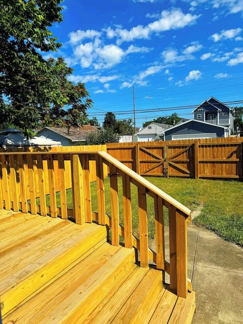Private deck and fenced in backyard