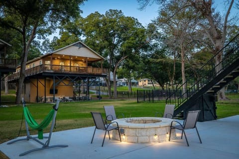 Cozy firepit with relaxing outdoor seating and views.