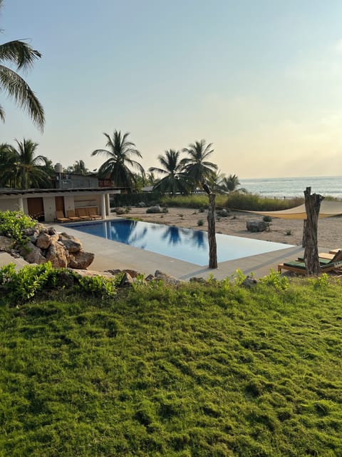 Pool and pool house with powder room and full outdoor kitchen