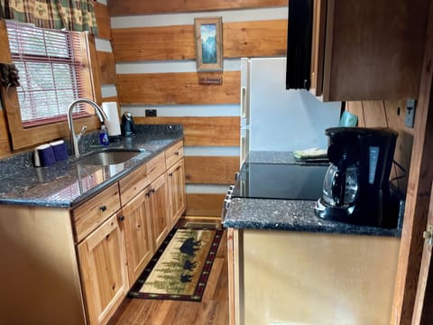 Kitchen is fully equipped including a standard coffee maker