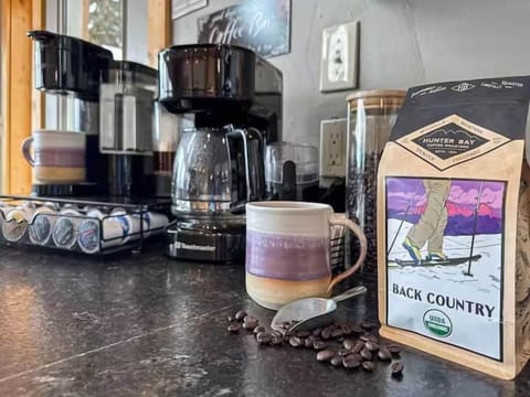 Grab your cup of coffee from the complimentary coffee station and enjoy the view