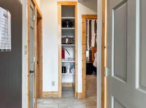 Past the kitchen are the main floor bedrooms and our mini pantry.