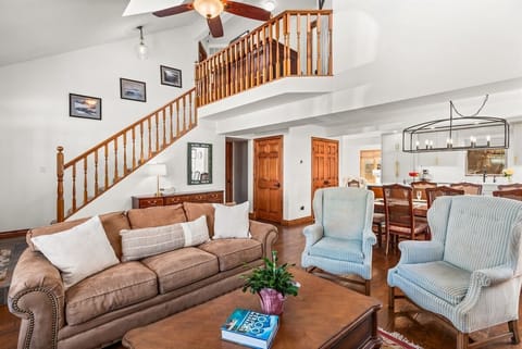 Spacious living room with cathedral ceilings and gas fireplace