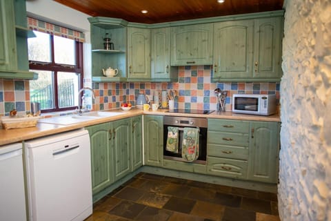 Kitchen with electric oven and hob