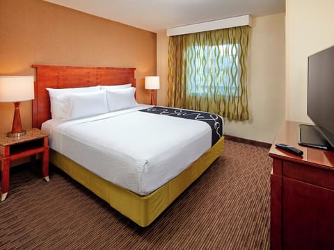 Unit with 1 King bed. Exact unit will be assigned upon arrival. Views, colors, and decor may vary.