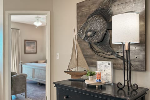 Step into the spacious primary bedroom, conveniently located just off the open concept living area for easy access and comfort